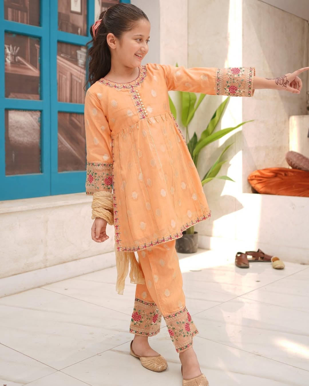 Children's festive-wear editorial in warm light