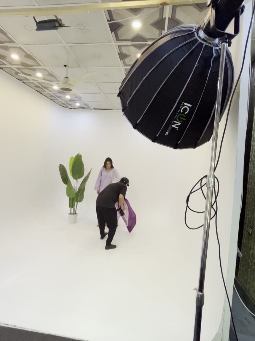 Behind the scenes — a fashion shoot lit with a studio softbox