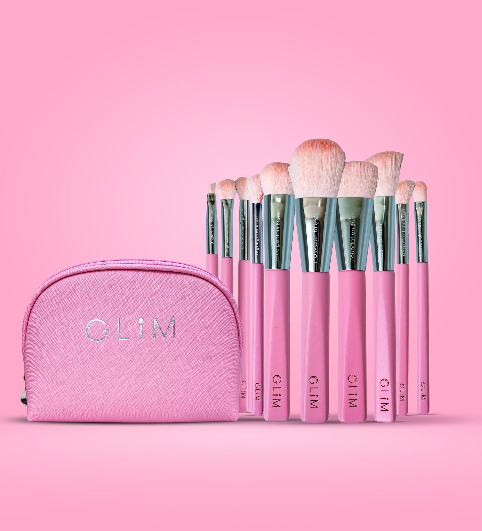 Makeup brush set on pink